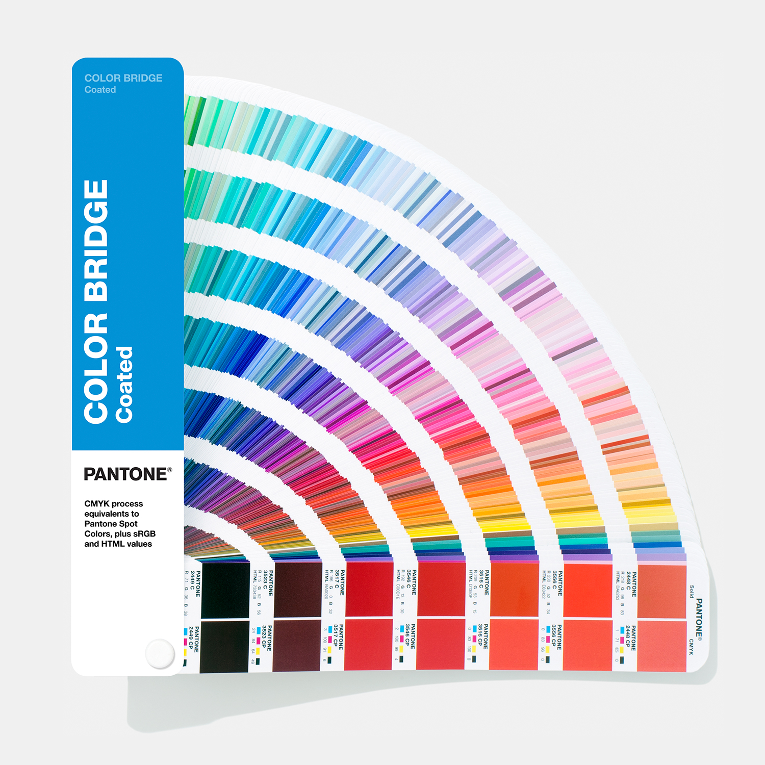 Open Pantone Formula Guide showing a fan of spot-colour swatches